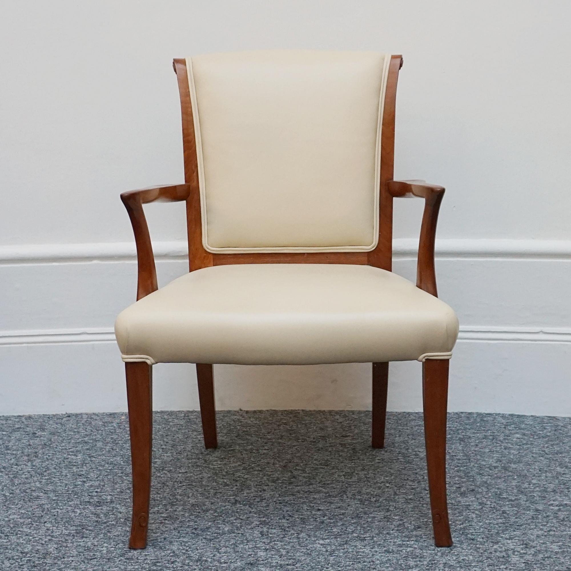 A pair of Art Deco side chairs. Solid walnut with carved scroll detail to feet and back. Upholstered in cream leather.

Dimensions: H 90cm W 60cm D 50cm, Seat H 45cm

Origin: English

Date: Circa 1935

Item Number: 0202244