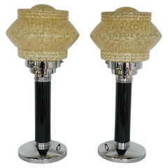 A Pair of Art Deco Style Chrome and Bakelite Table Lamps