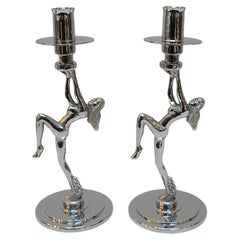 A Pair of Art Deco Style Chromed Candlesticks