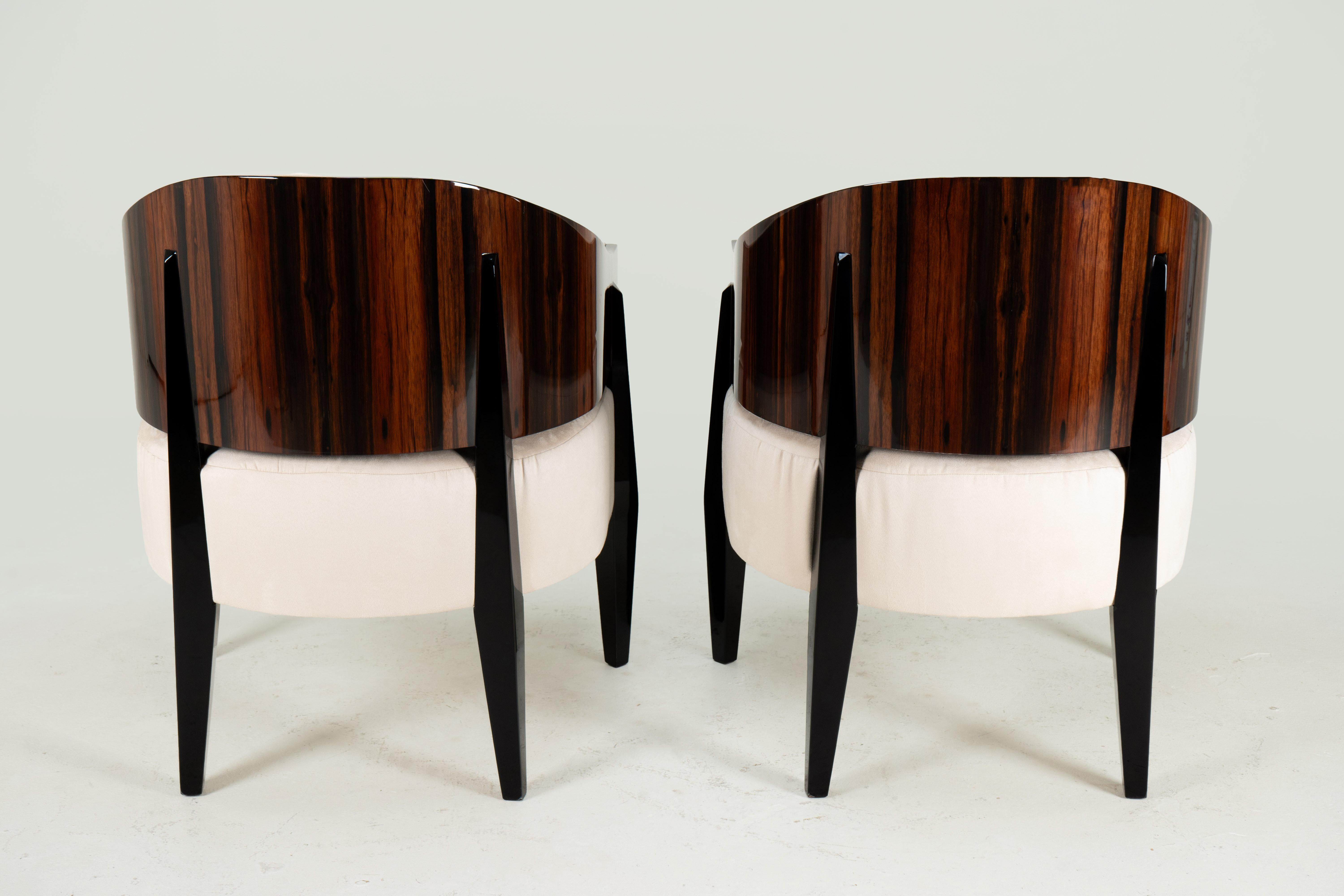 A Pair of Art Deco Style Curved-Back Lounge Chairs In Good Condition For Sale In Chicago, IL