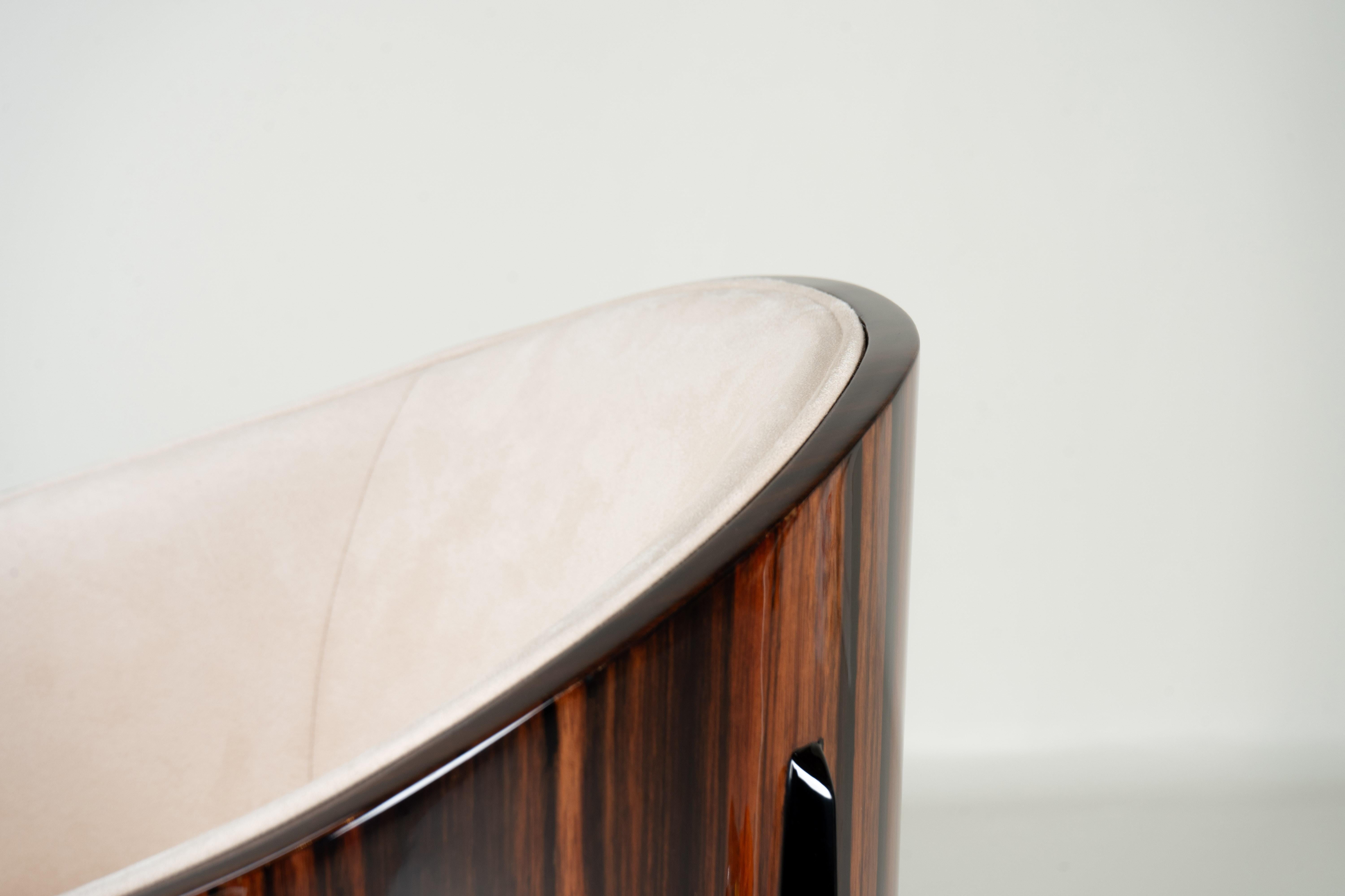 A Pair of Art Deco Style Curved-Back Lounge Chairs For Sale 1
