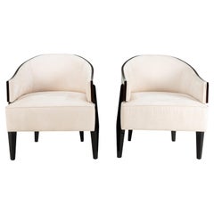 A Pair of Art Deco Style Curved-Back Lounge Chairs
