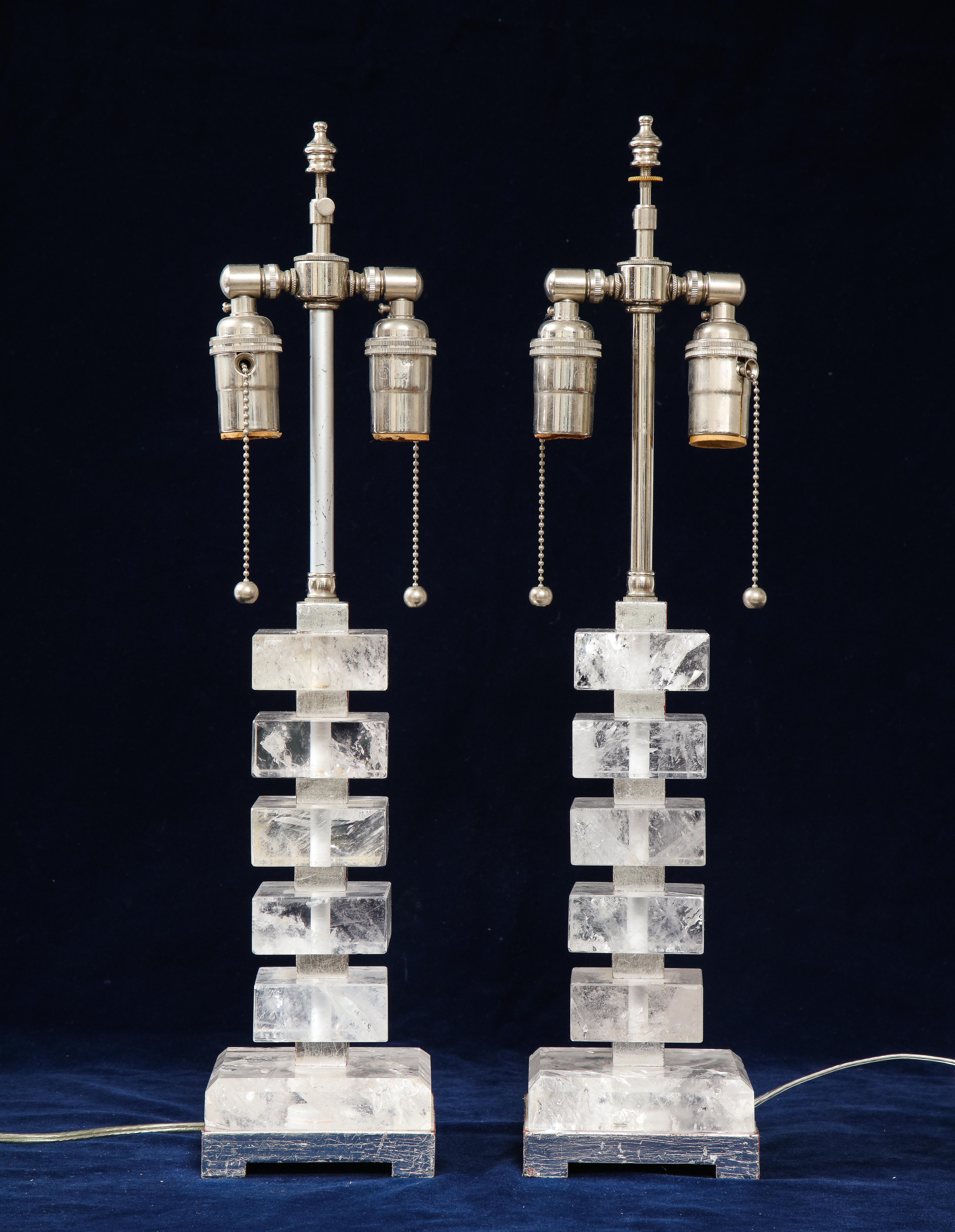 A very fine pair of hand diamond cut square shaped Art Deco style rock crystal and silvered wood table lamps, 20th century. The Rock Crystal is beautifully hand cut and hand polished and of very Fine quality, in the Jansen style, Paris.

Height