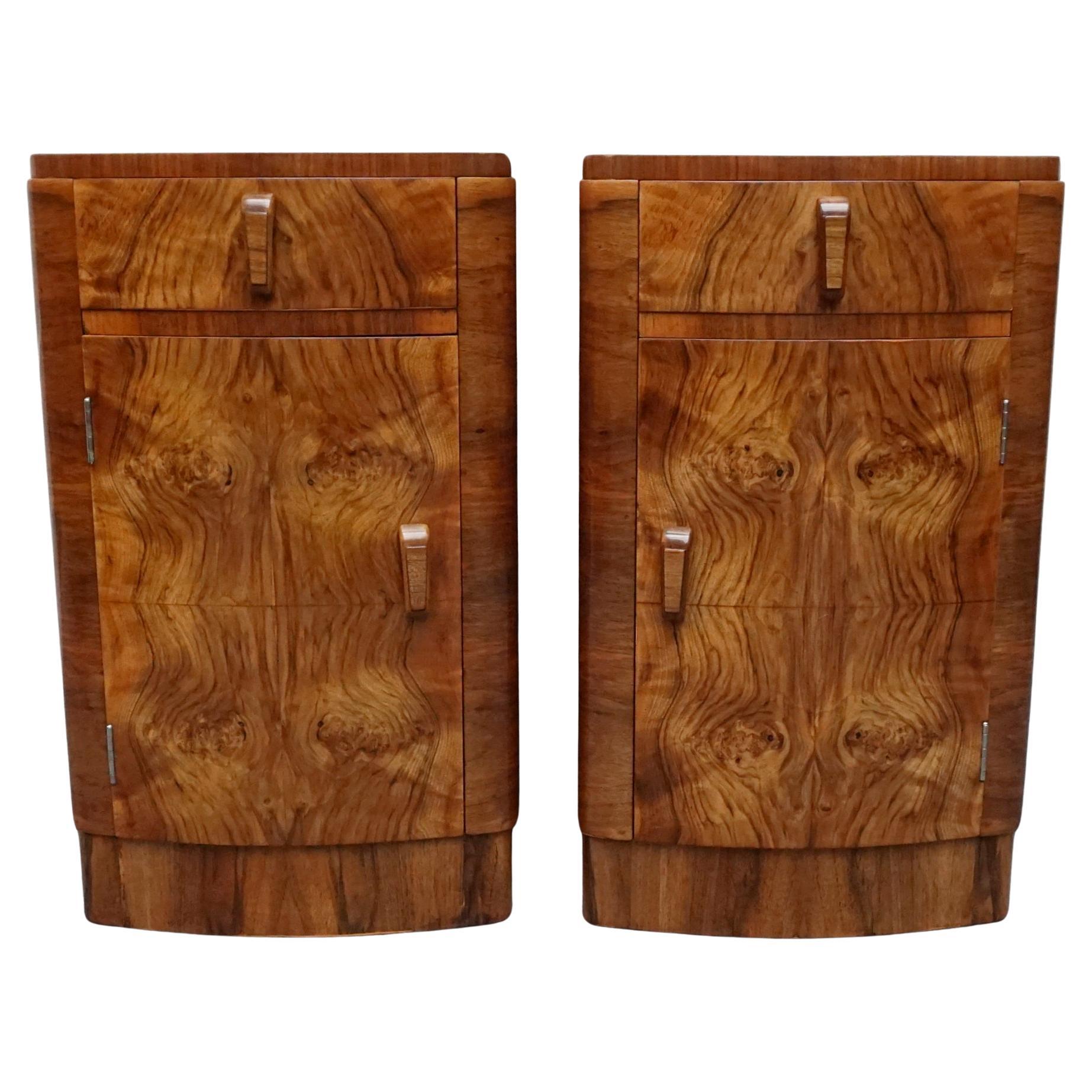 A Pair of Art Deco Walnut Bedside Cabinets