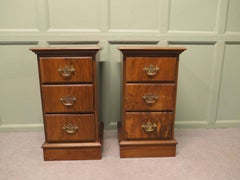 A Pair of Art Deco Walnut Bedside Chest of Drawers