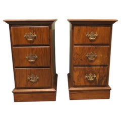 A Pair of Art Deco Walnut Bedside Chest of Drawers