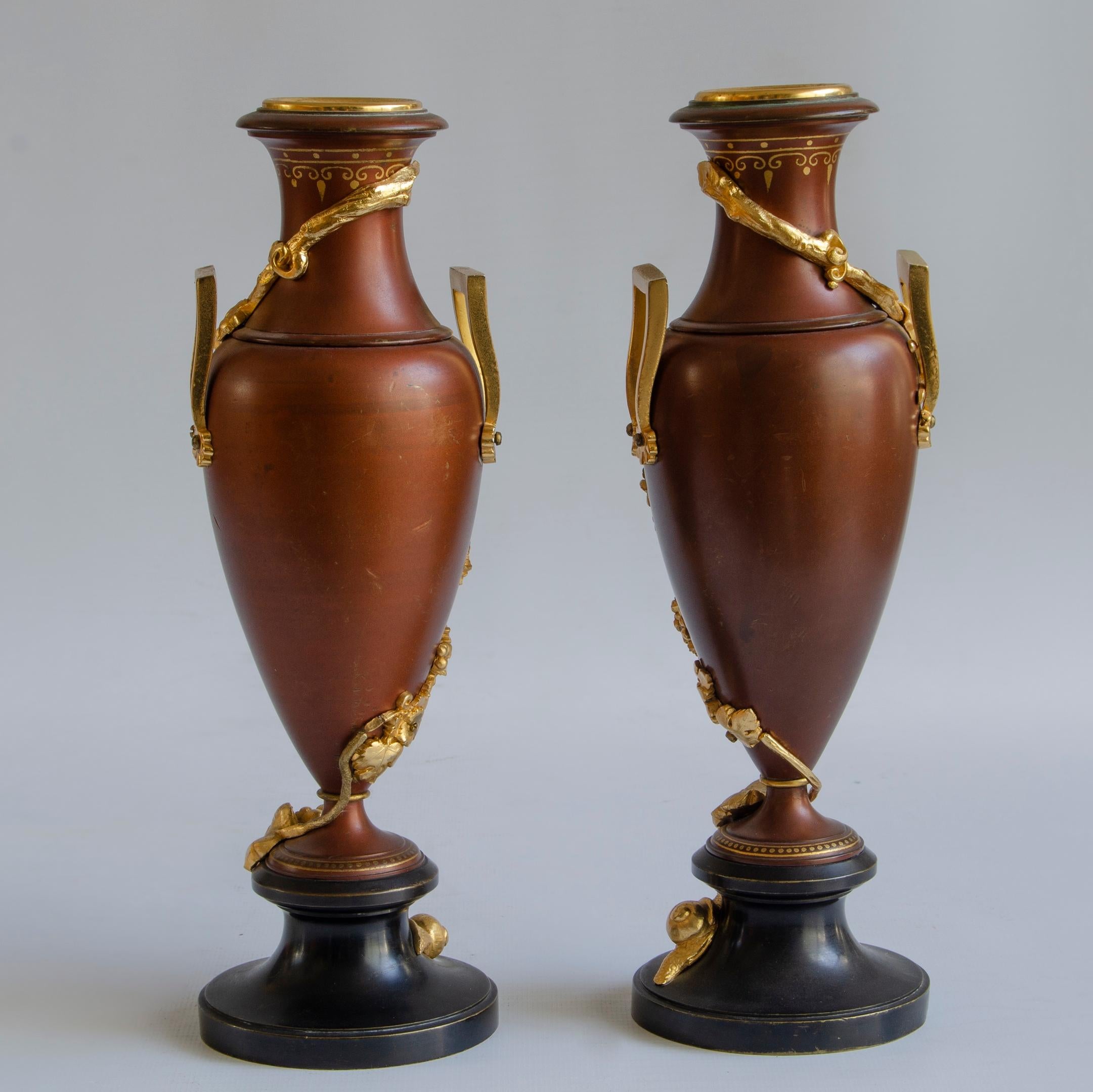 A pair of Art nouveau amphorae
patinated bronze and gilt,
circa 1910
decorated with vine plants and snails
Origin France
perfect condition.
Art nouveau, modernist art or modernism was an international artistic and decorative movement, developed