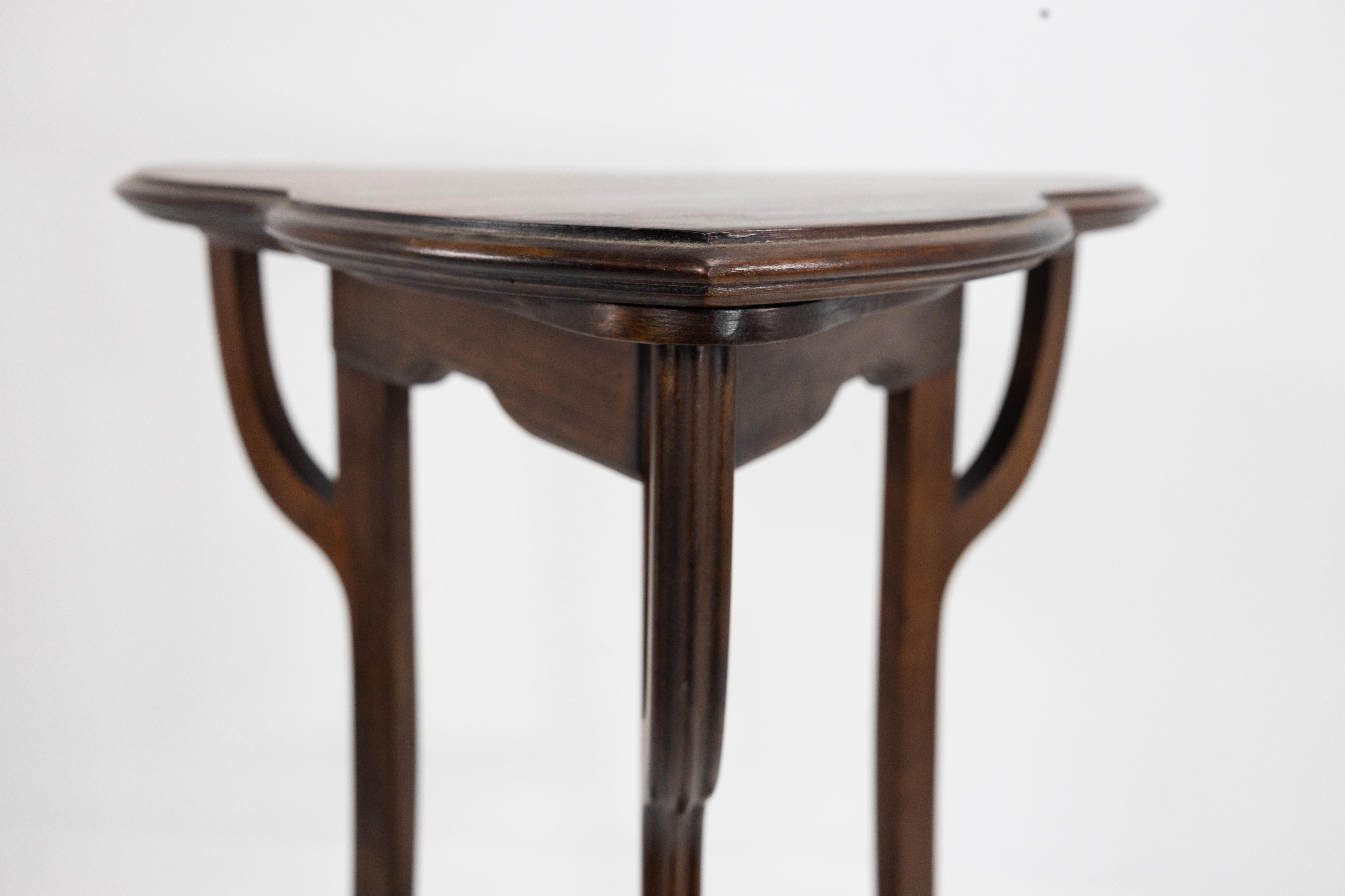 A pair of Art Nouveau beech stained side tables with clover leaf style tops For Sale 8