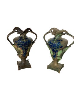 A pair of Art Nouveau porcelain vases, produced by Amphora