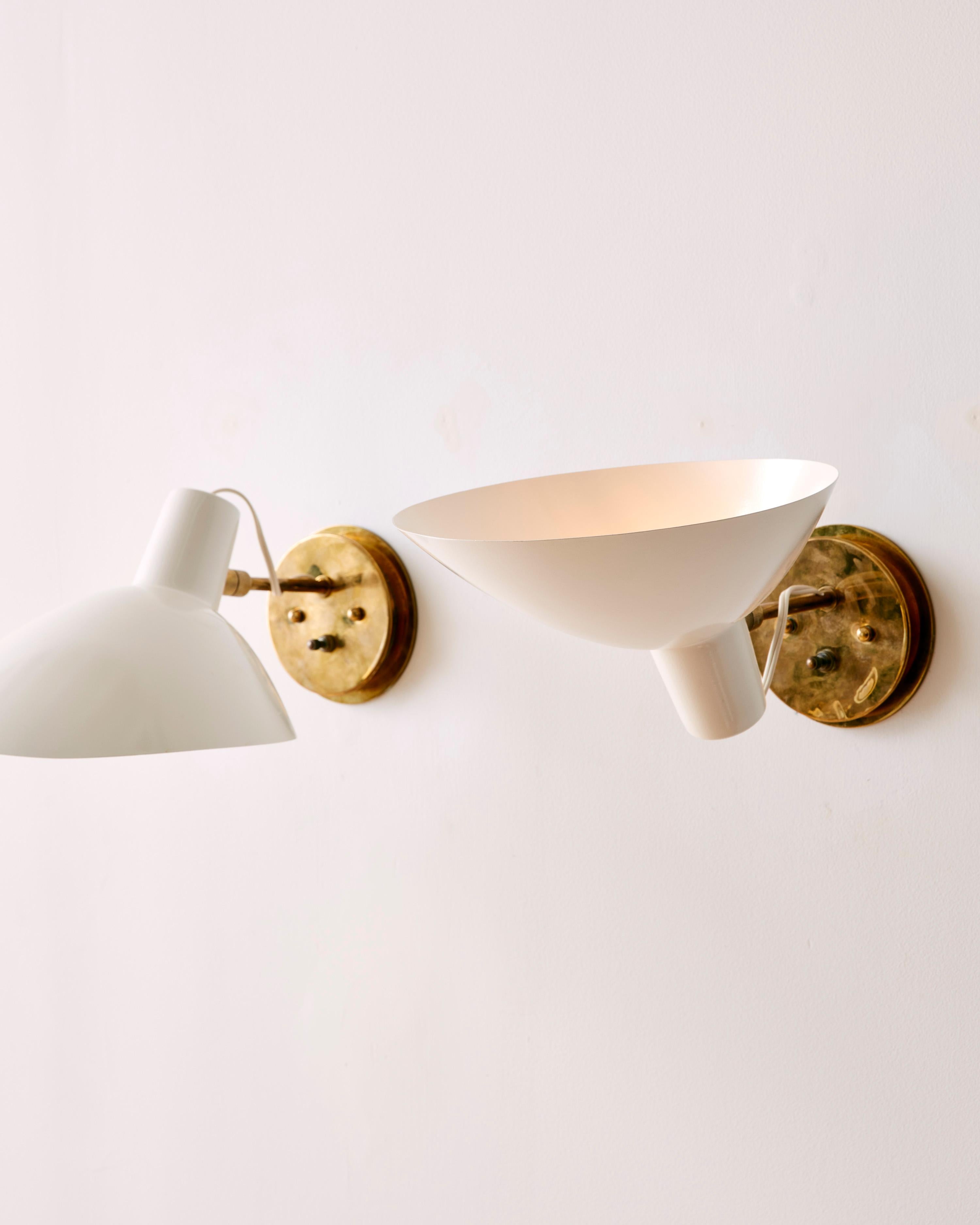 Mid-Century Modern A Pair of Articulated Wall Sconces by Vittoriano Vigano For Sale