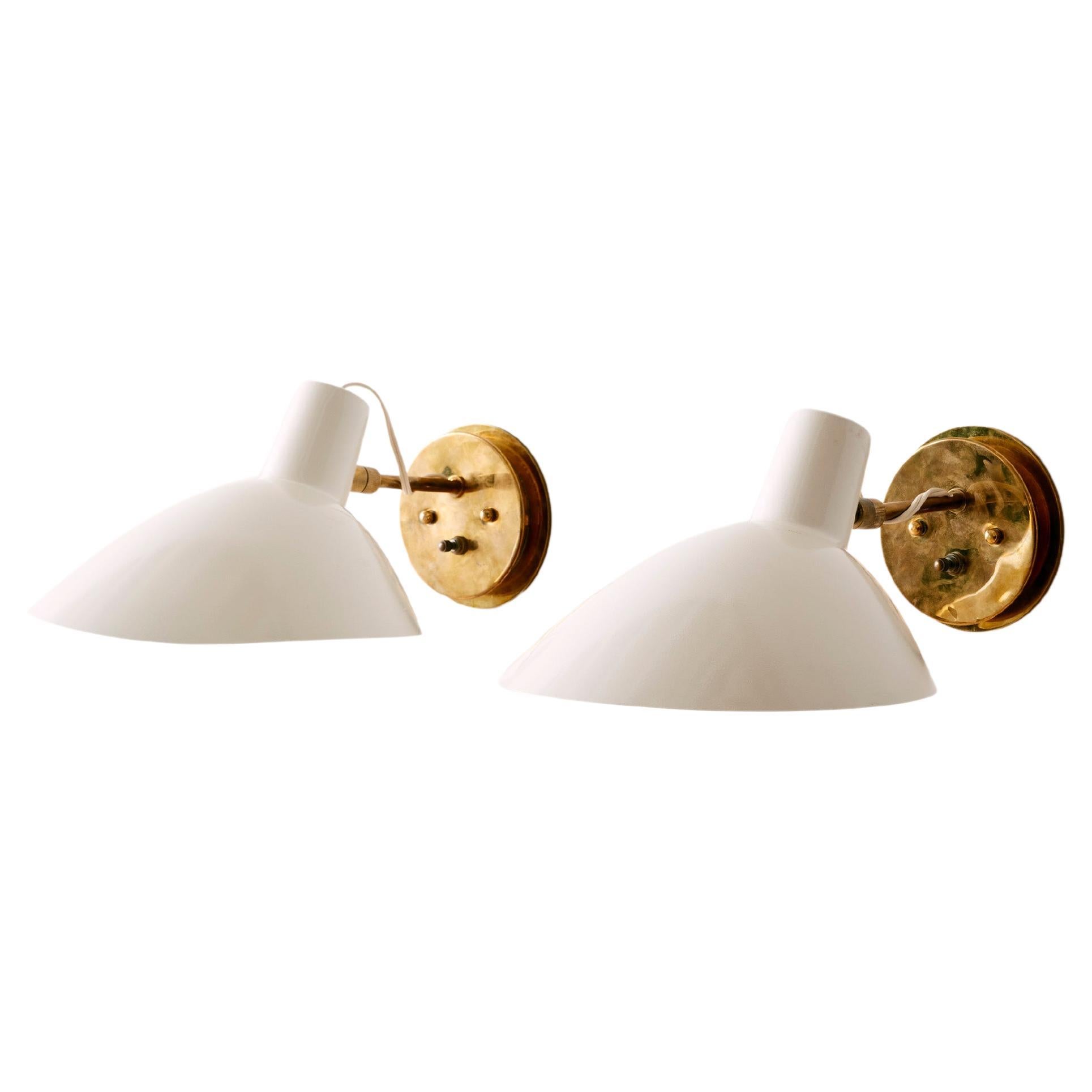 A Pair of Articulated Wall Sconces by Vittoriano Vigano For Sale