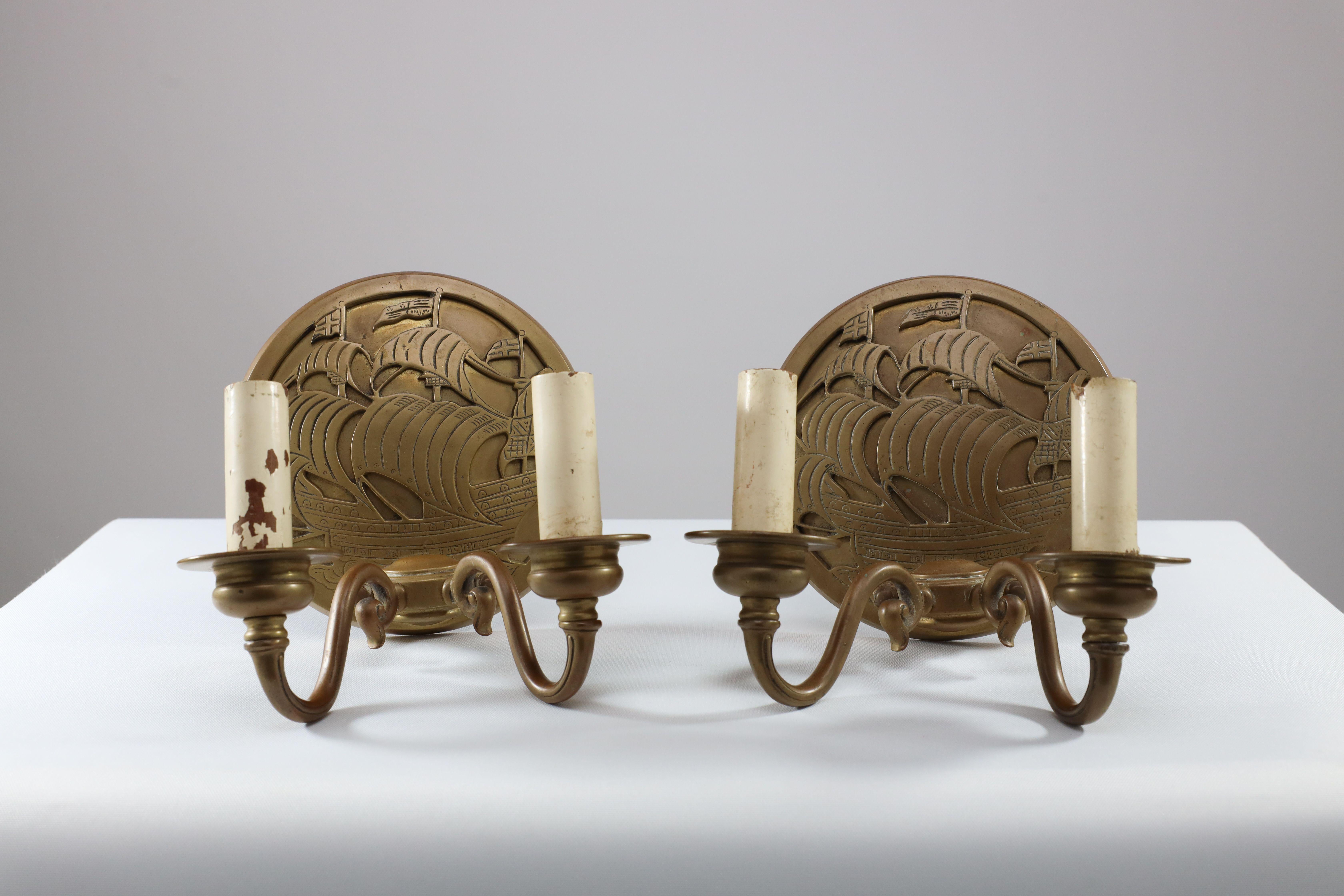 English A pair of Arts and Crafts brass wall lights with Galleons in sail. For Sale