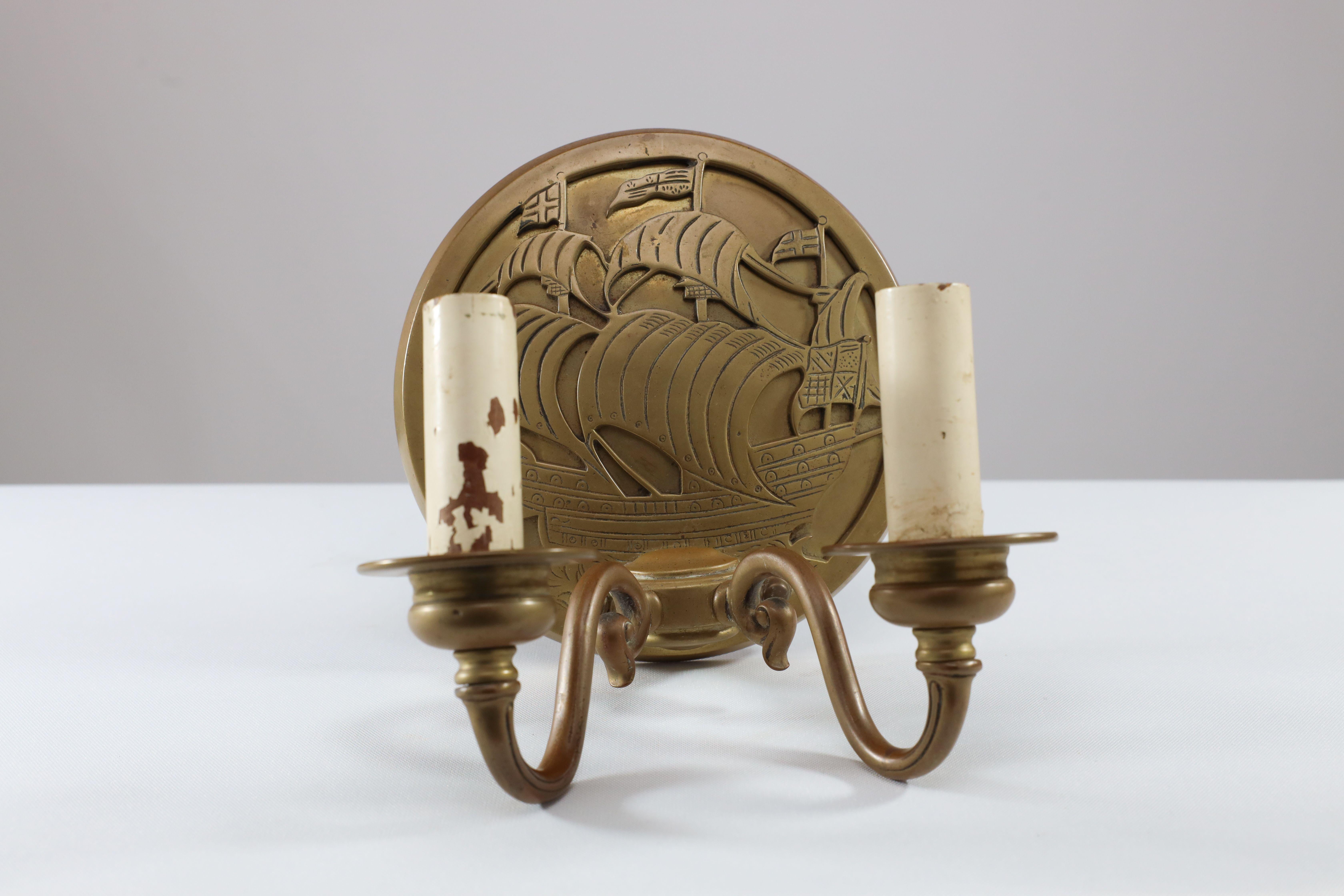A pair of Arts and Crafts brass wall lights with Galleons in sail. In Good Condition For Sale In London, GB