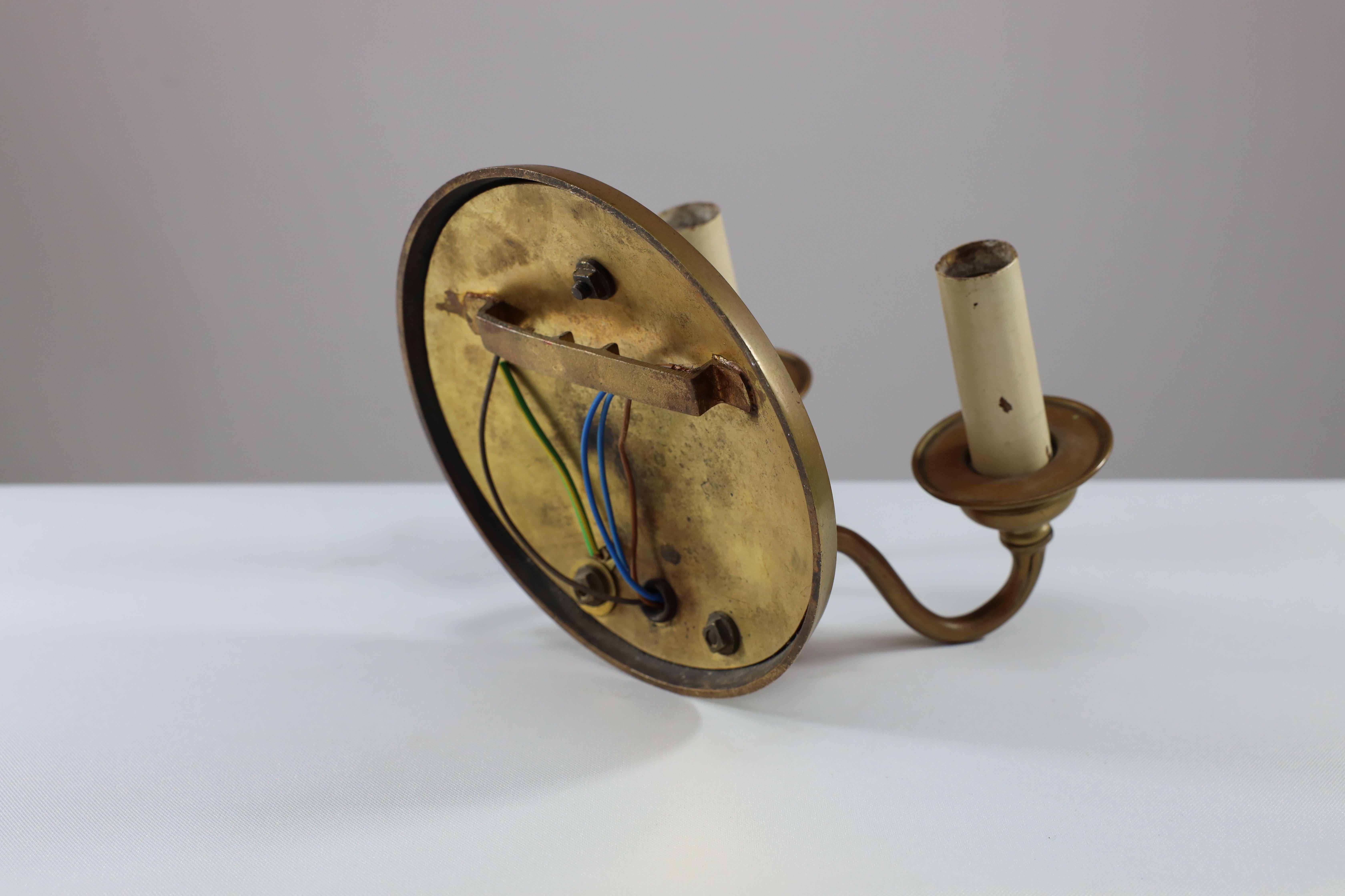 Brass A pair of Arts and Crafts brass wall lights with Galleons in sail. For Sale