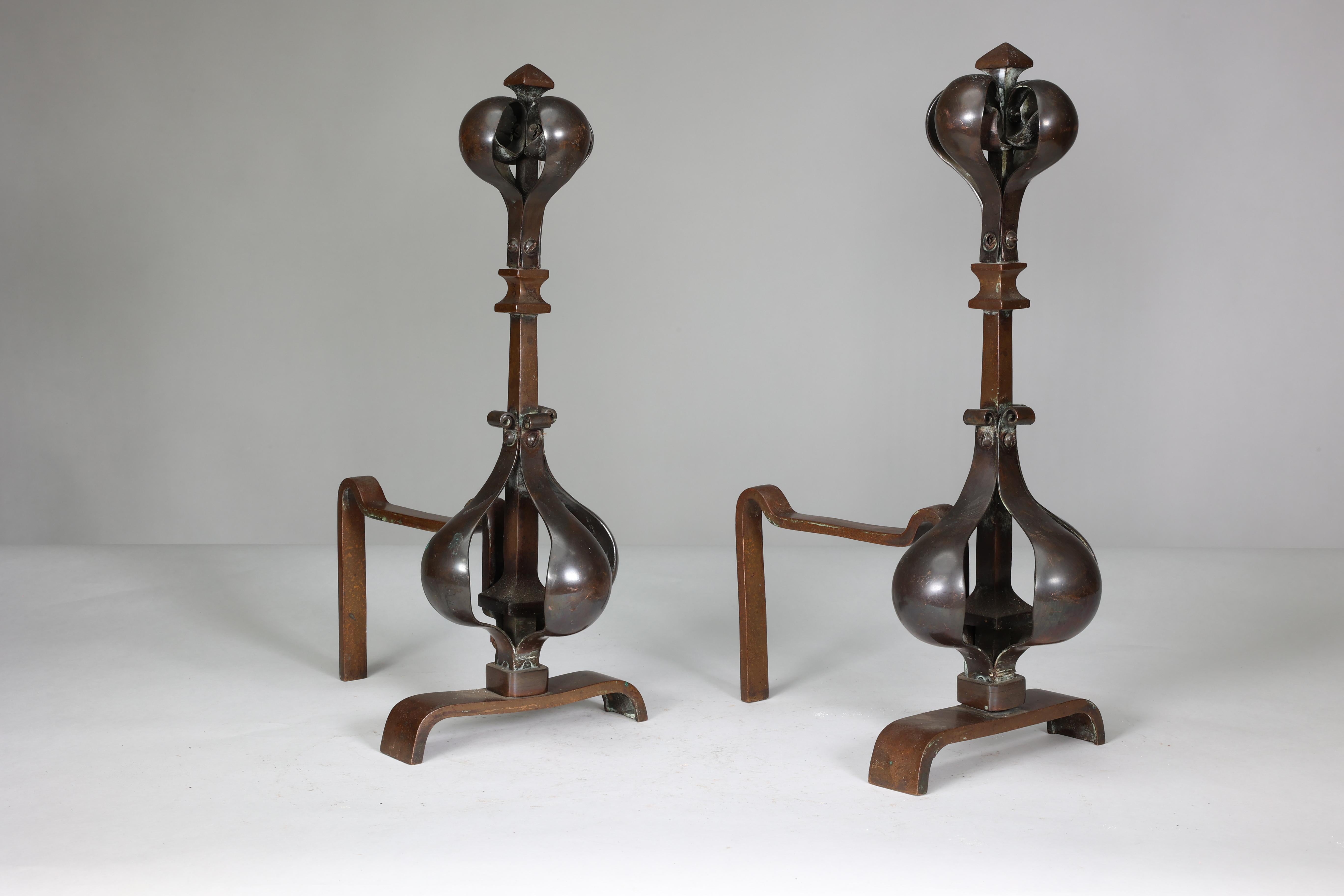 A pair of Arts and Crafts copper and bronze fire dogs with pyramid style finials For Sale 2