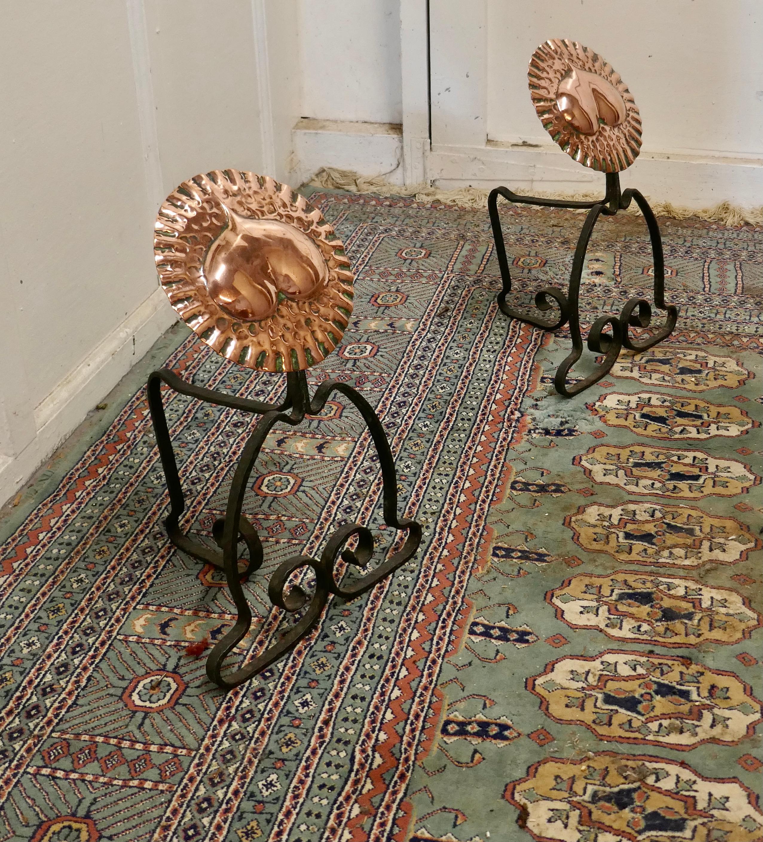A pair of Arts & Crafts copper and iron andirons or fire dogs


This very stylish pair of cast iron andirons with a large hand beaten copper medallion, they are 16” high, 14” long and 11” wide across the front, they are in excellent but obviously