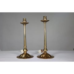 Pair of Arts & Crafts copper table lamps with three repousse hearts to the base