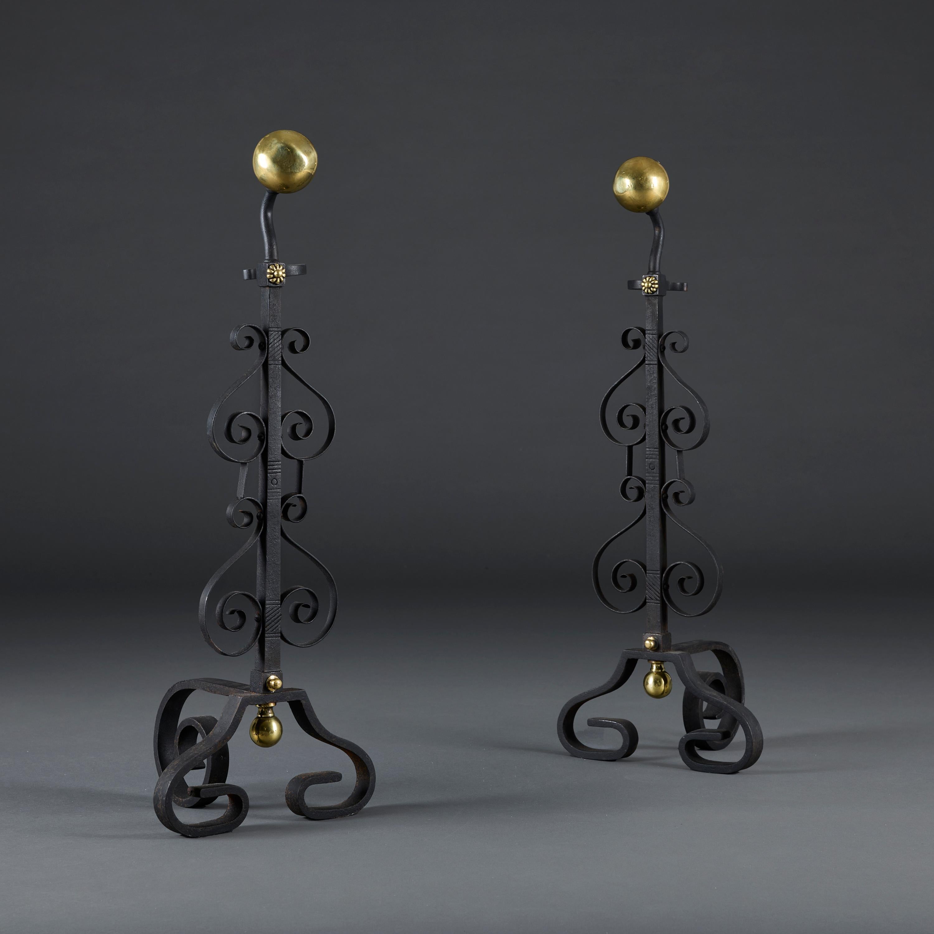 England, circa 1890

A large pair of Arts and Crafts fire dogs in the manner of Thomas Jeckyll, the wrought iron stems flanked with swirling decoration and mounted to the tops with polished brass spheres.

Height 70.00cm

Width 25.00cm

Depth 20.00cm