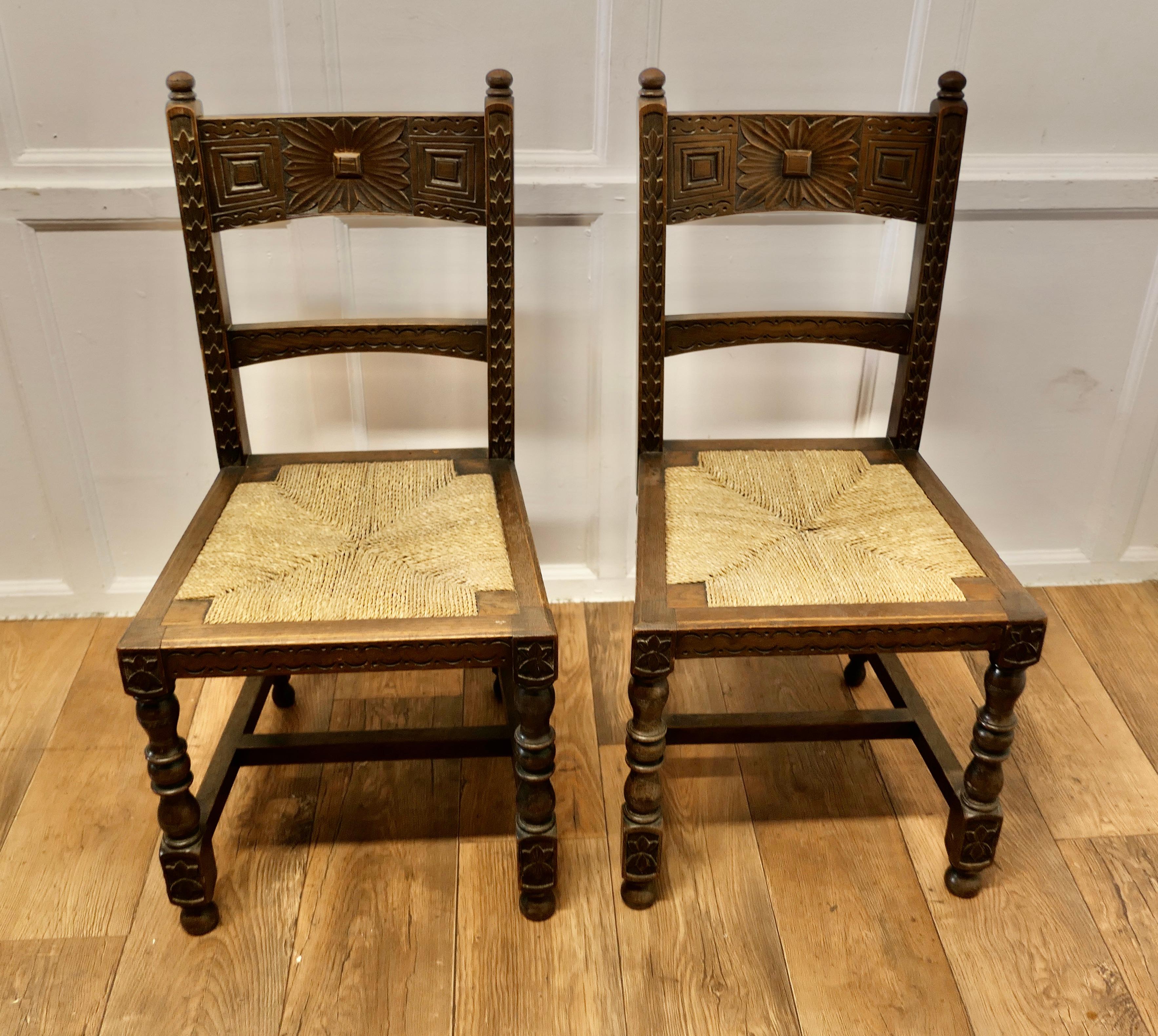 A Pair of Arts and Crafts Gothic Carved Oak Hall Chairs   In Good Condition In Chillerton, Isle of Wight