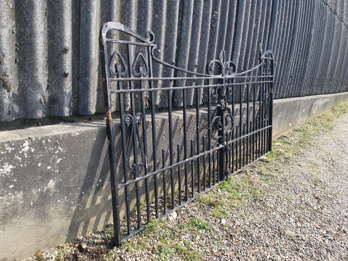 Hand-Crafted Pair of Arts & Crafts Hand Forged Iron Gates with Sweeping Top Rails