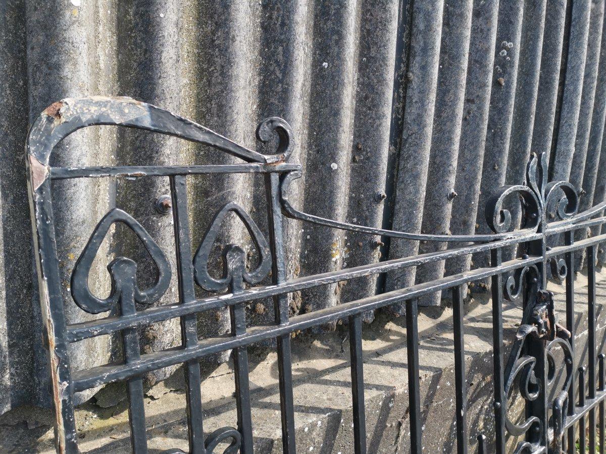 Early 20th Century Pair of Arts & Crafts Hand Forged Iron Gates with Sweeping Top Rails