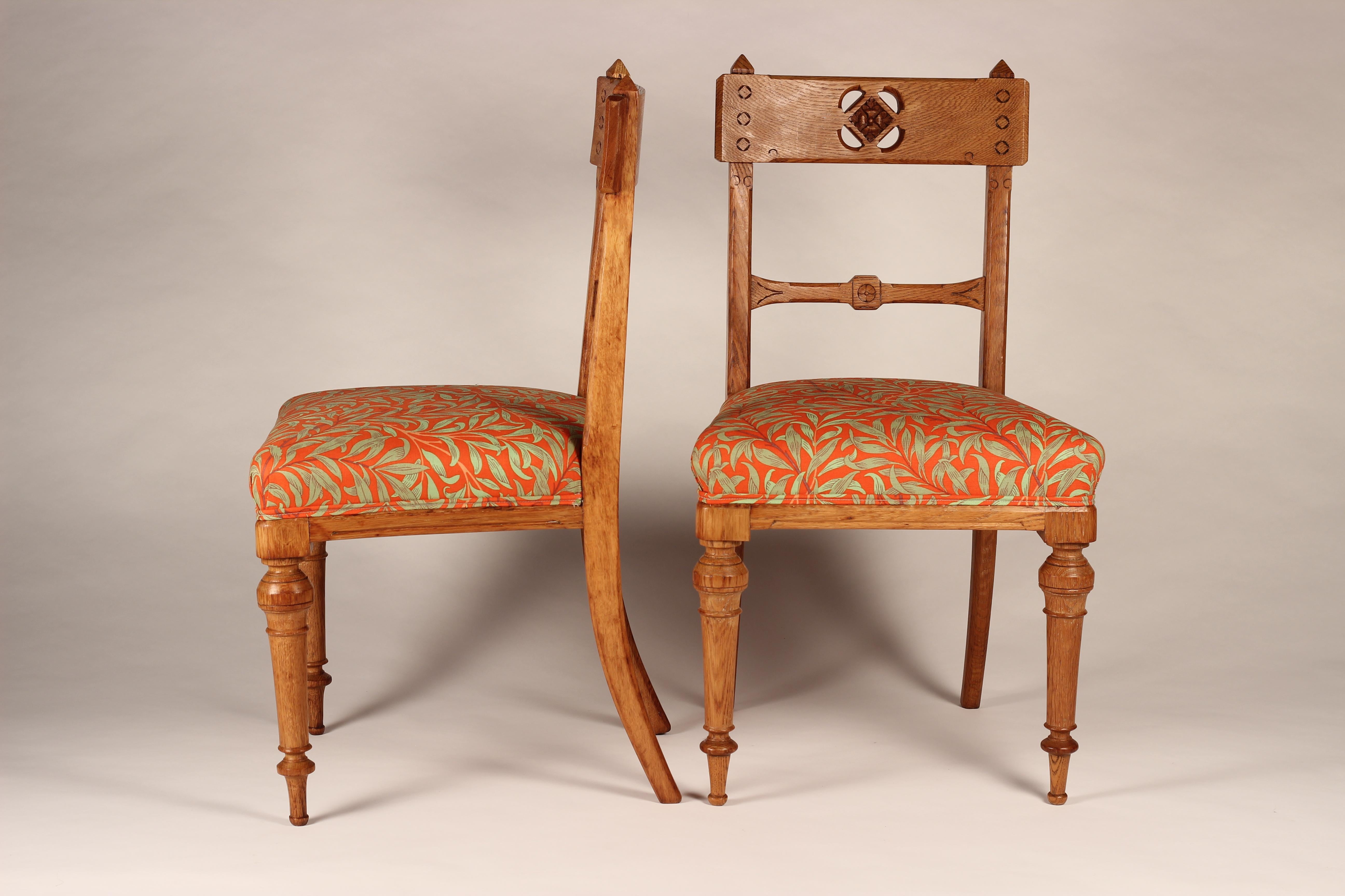 Fabric Pair of Arts & Crafts Oak Back Pierced Hall Chairs with fabric by Morris & Co For Sale