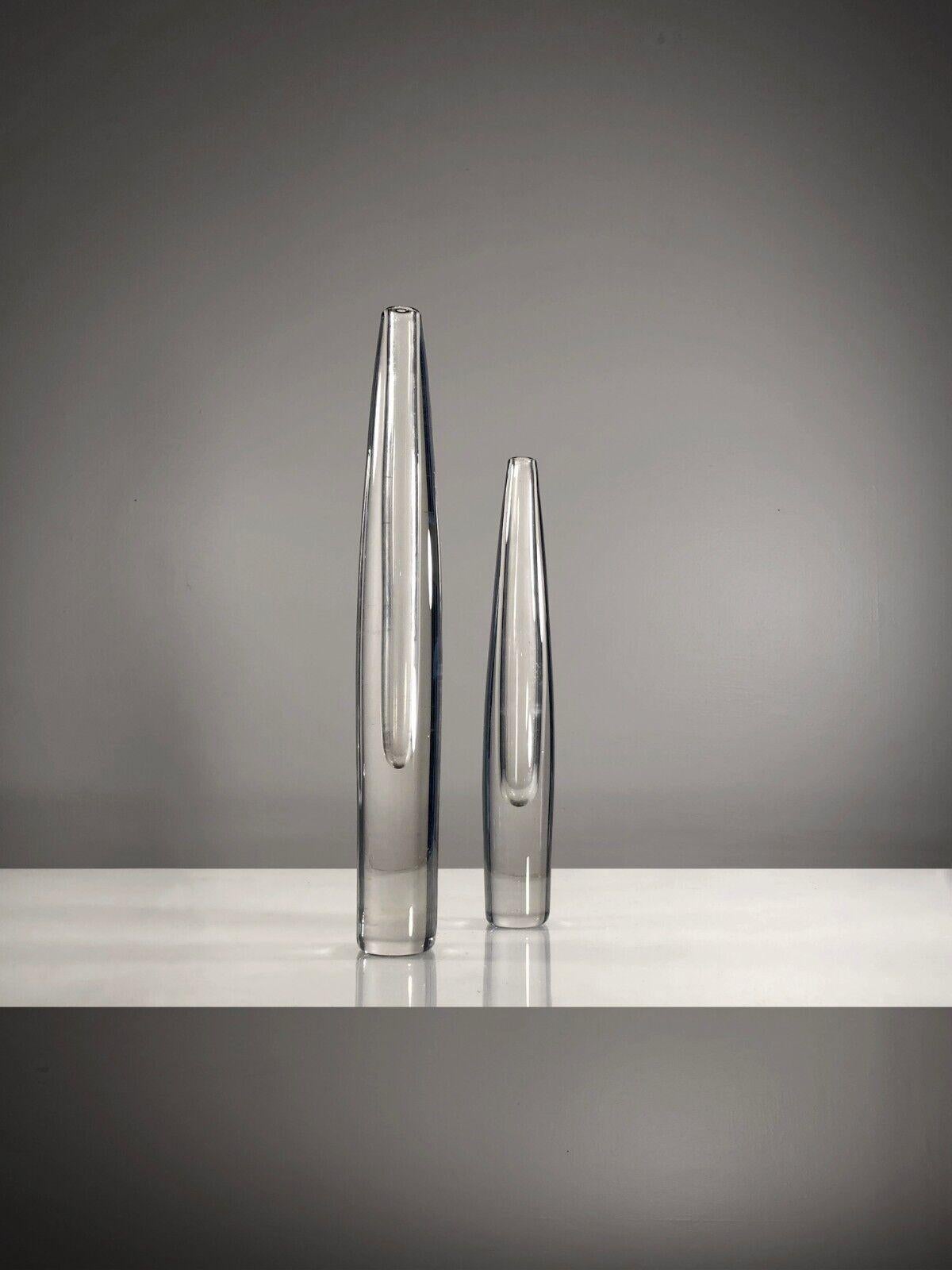 A very beautiful asymmetrical pair of vases, Modernist, Free-Form, Dansk, Scandinavian, in thick transparent glass, model numbers B896 and B894 and Stromberg signatures incised with acid under each base, by Asta Stromberg, Sweden 1970.