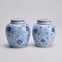 A pair of attractive, 18th C Chinese porcelain blue and white jars and covers