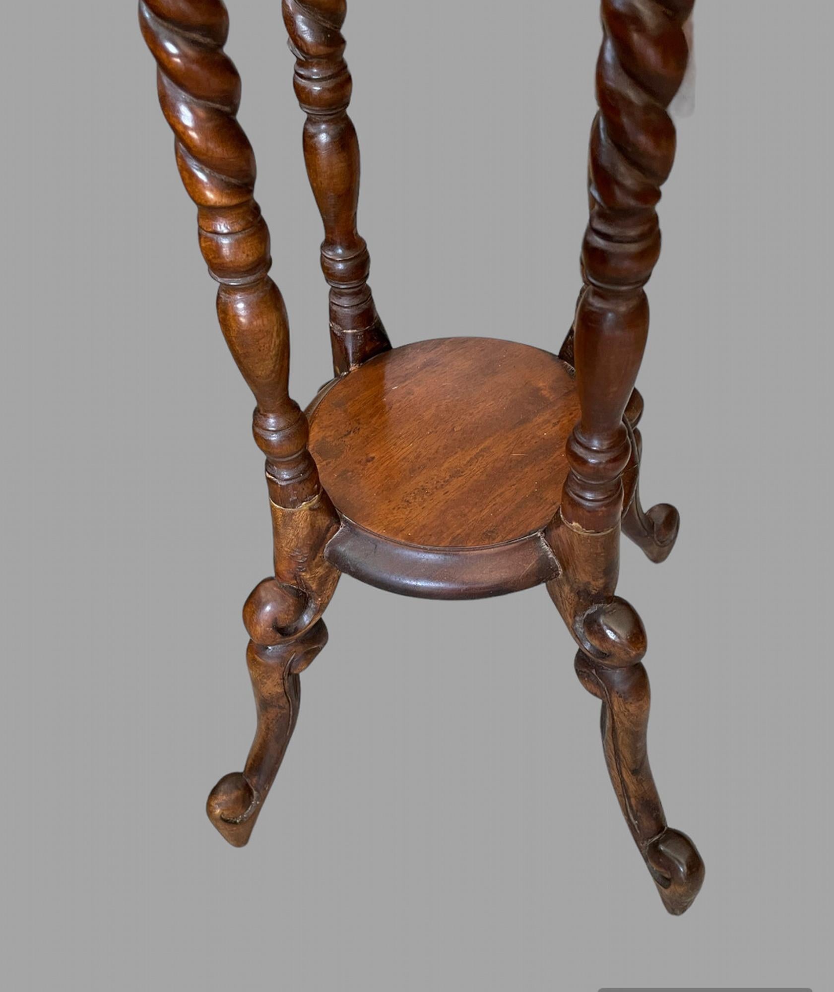 Victorian A Pair of Attractive Mahogany Torchieres For Sale