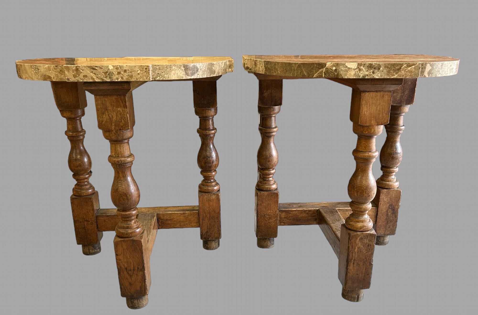 A Pair of Attractive and Useful Marble Topped Console/Side Tables on turned oak solid bases. Practical for many purposes and a very solid pair, one table has had professional restoration to the original marble.