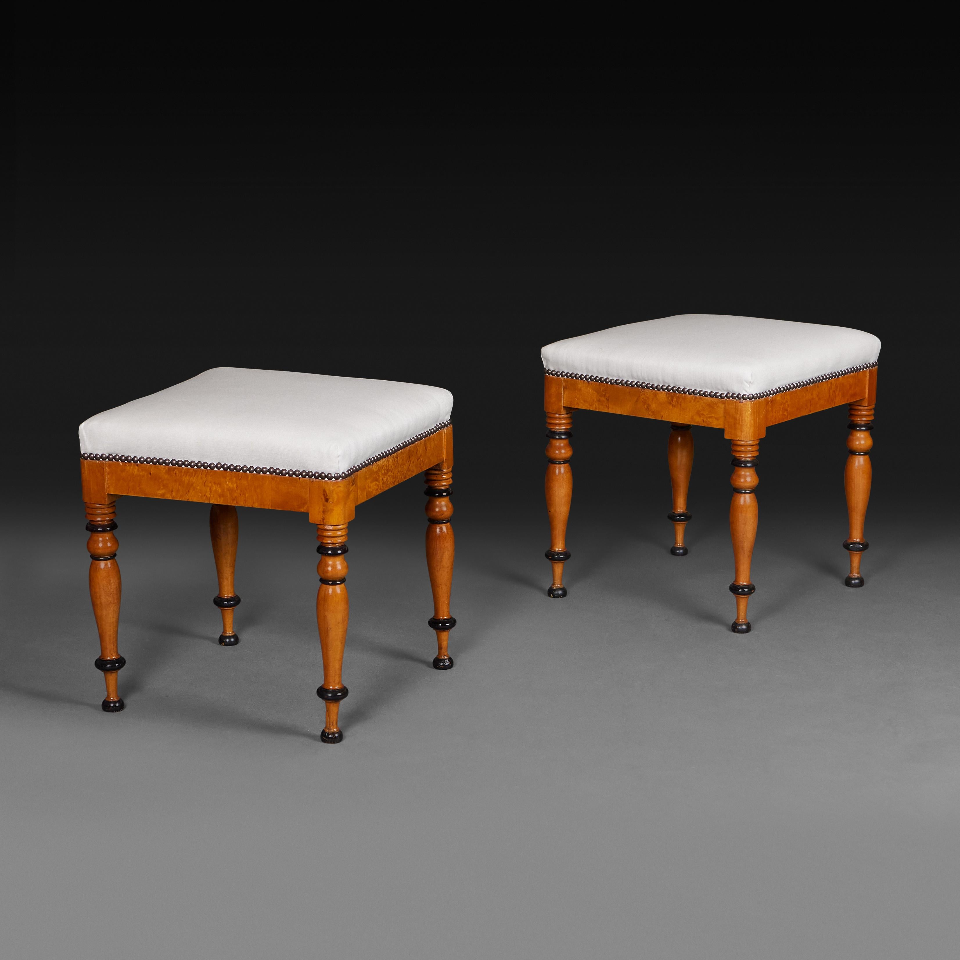 Austria, circa 1880

A pair of Biedermeier stools with Maplewood bases, the legs turned with ebonised bands, now with seats upholstered in white linen.

Height        45.00cm
Width          42.00cm
Depth          42.00cm