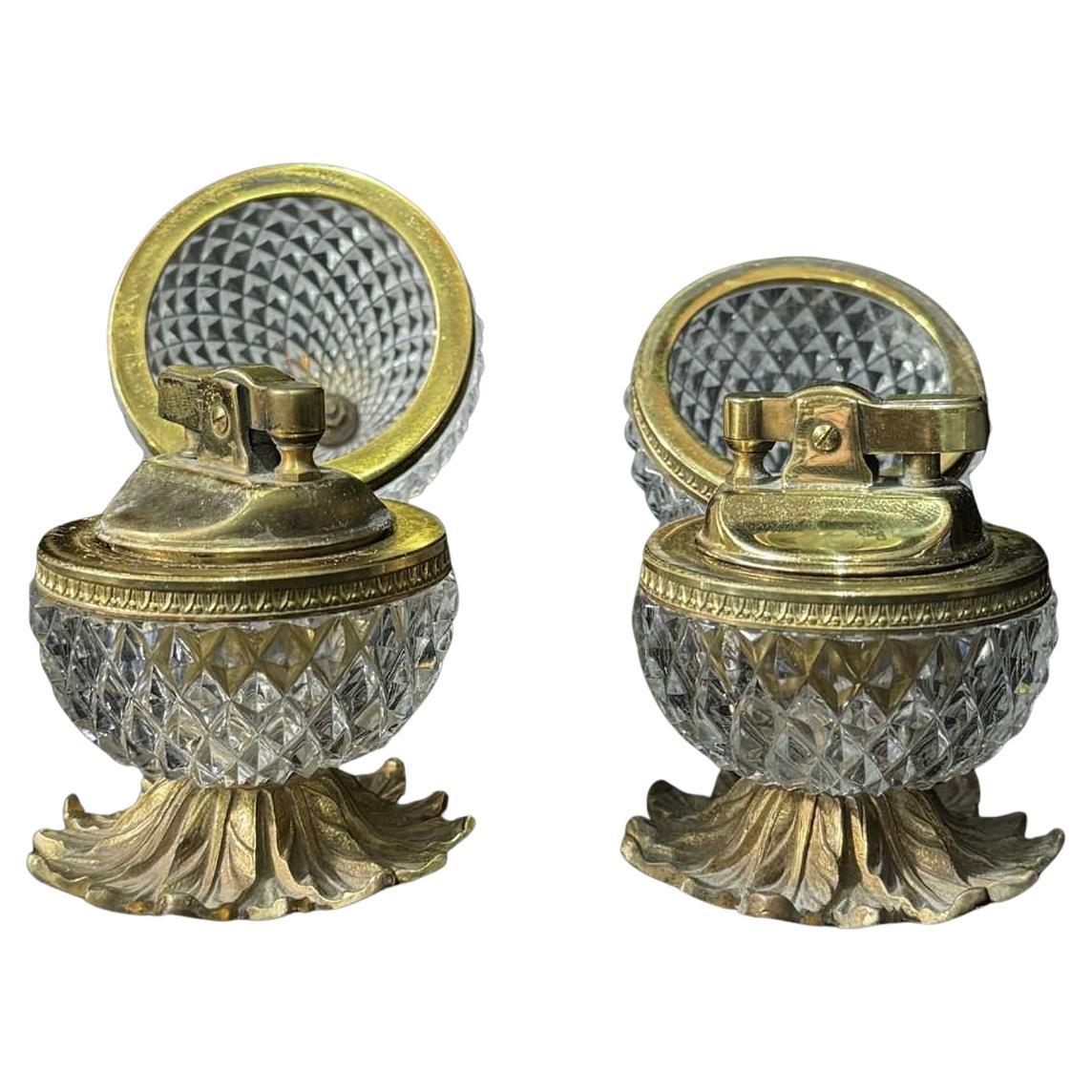 A Pair of Baccarat Diamond Cut Glass Gilt Brass Table Lighters Of