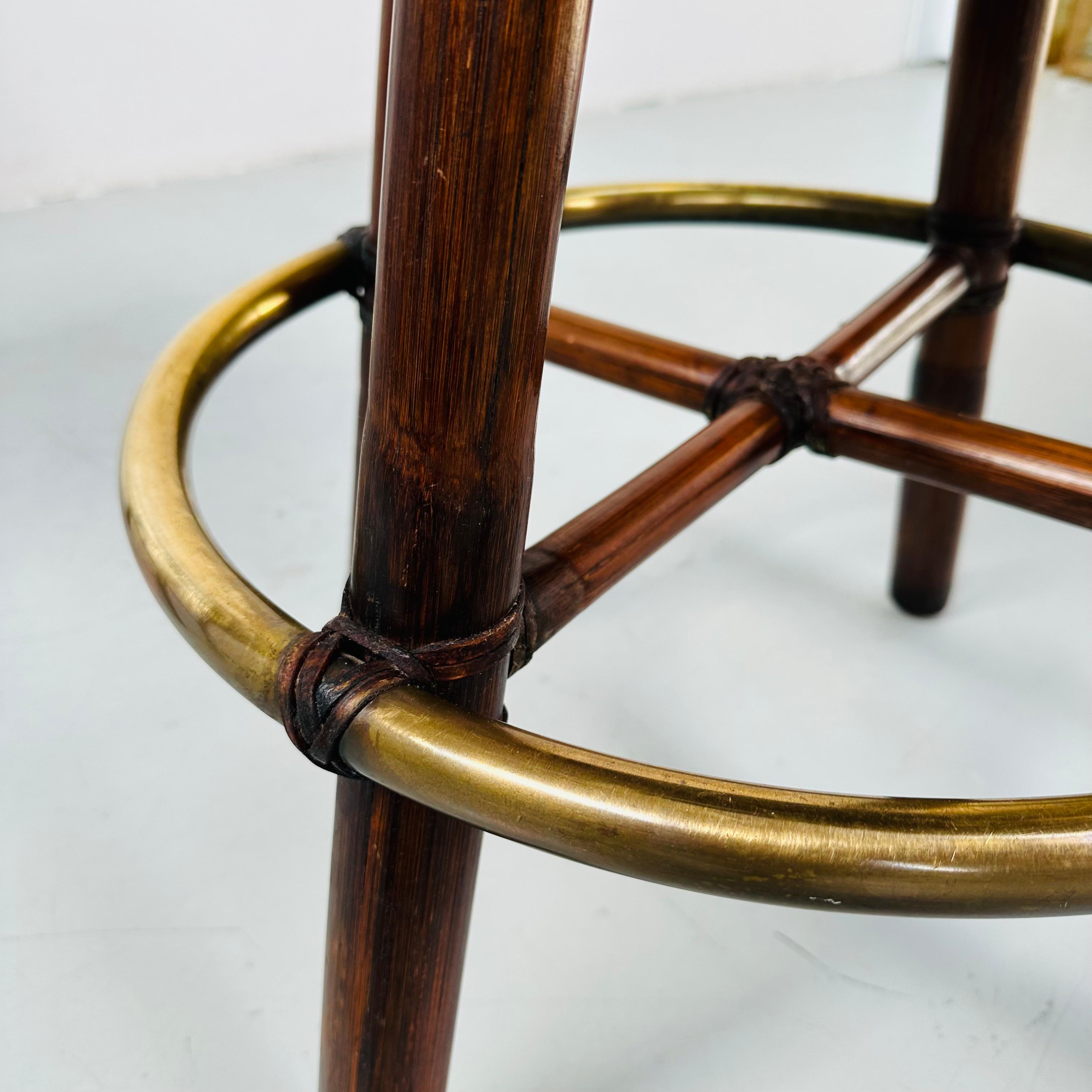 Bohemian A pair of Bamboo Bar Stools with Brass by Hans Kaufeld for McGuire , 1970s. For Sale