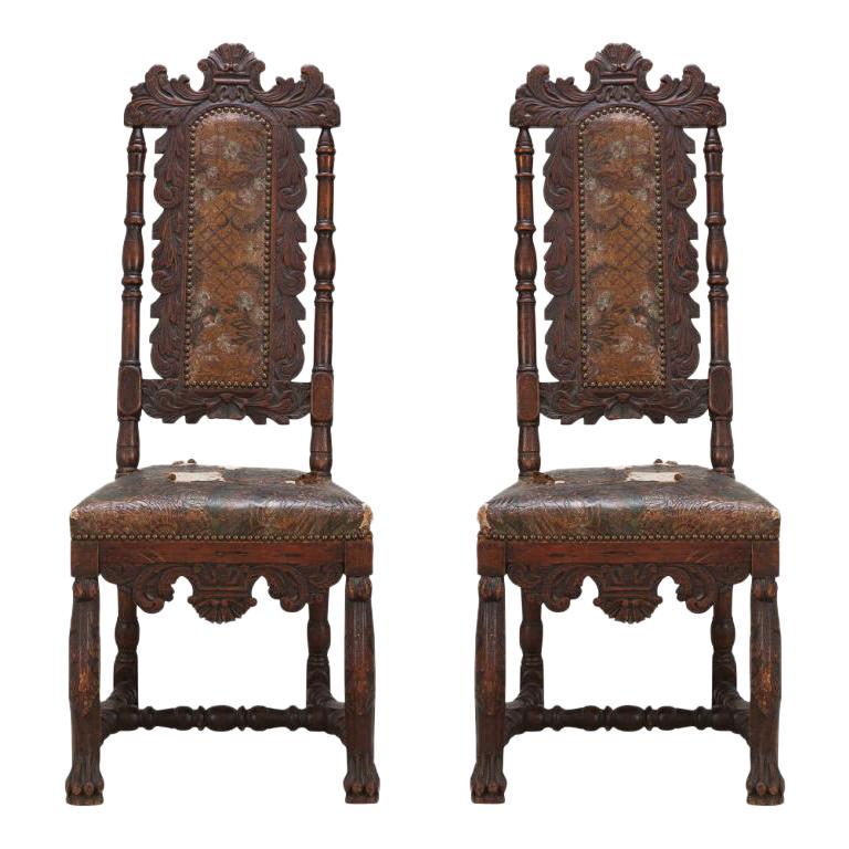 A Pair of Baroque Side Chairs with original leather