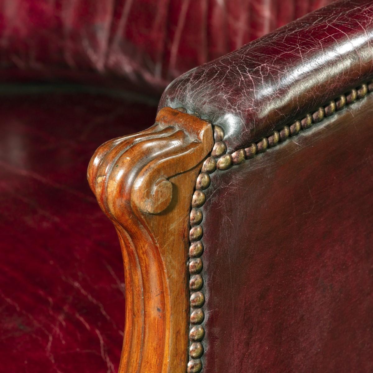 Pair of Barrel-Backed Mahogany Wing Armchairs 1