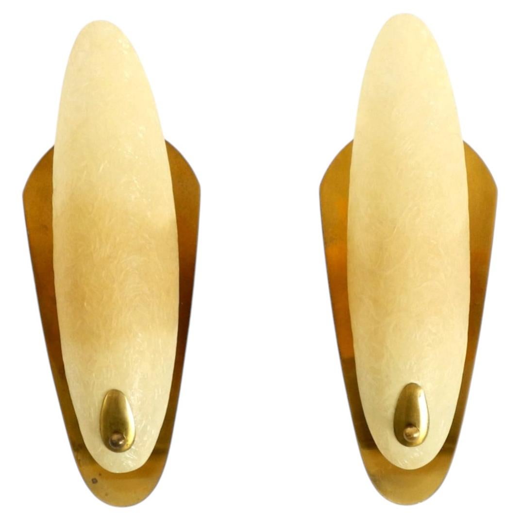 A pair of beautiful Mid-Century Modern brass wall lamps with fiberglass shades