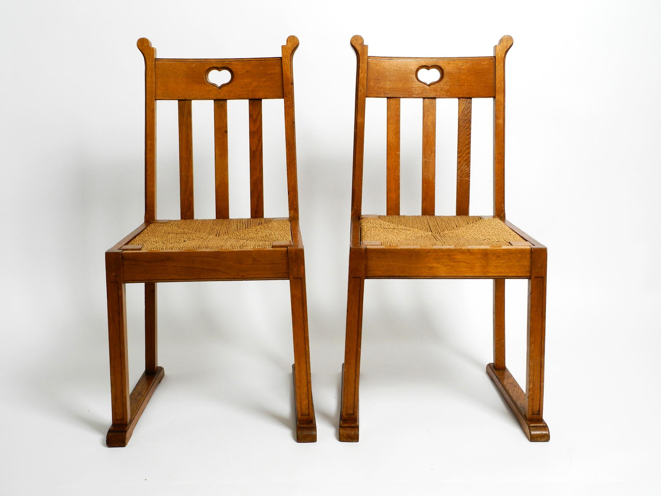 One pair of beautiful, very rare Mid Century solid oak chairs with skid base. The seats are made of raffia.
High quality solid production with many details.
With a gorgeous patina. Undamaged and 100% original condition.
No woodworm damages. No