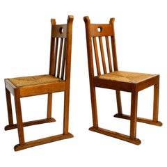 Pair of Beautiful Rare Mid Century Oak Chairs with Skid Feet and Wicker Seats