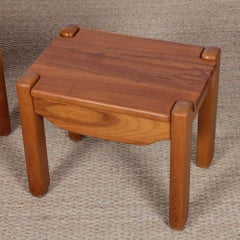 A pair of bedside tables in solid elm dating from the 1980s