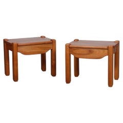 A pair of bedside tables in solid elm dating from the 1980s