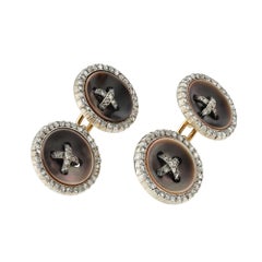 Un paio di gemelli Belle Époque in madreperla e diamanti