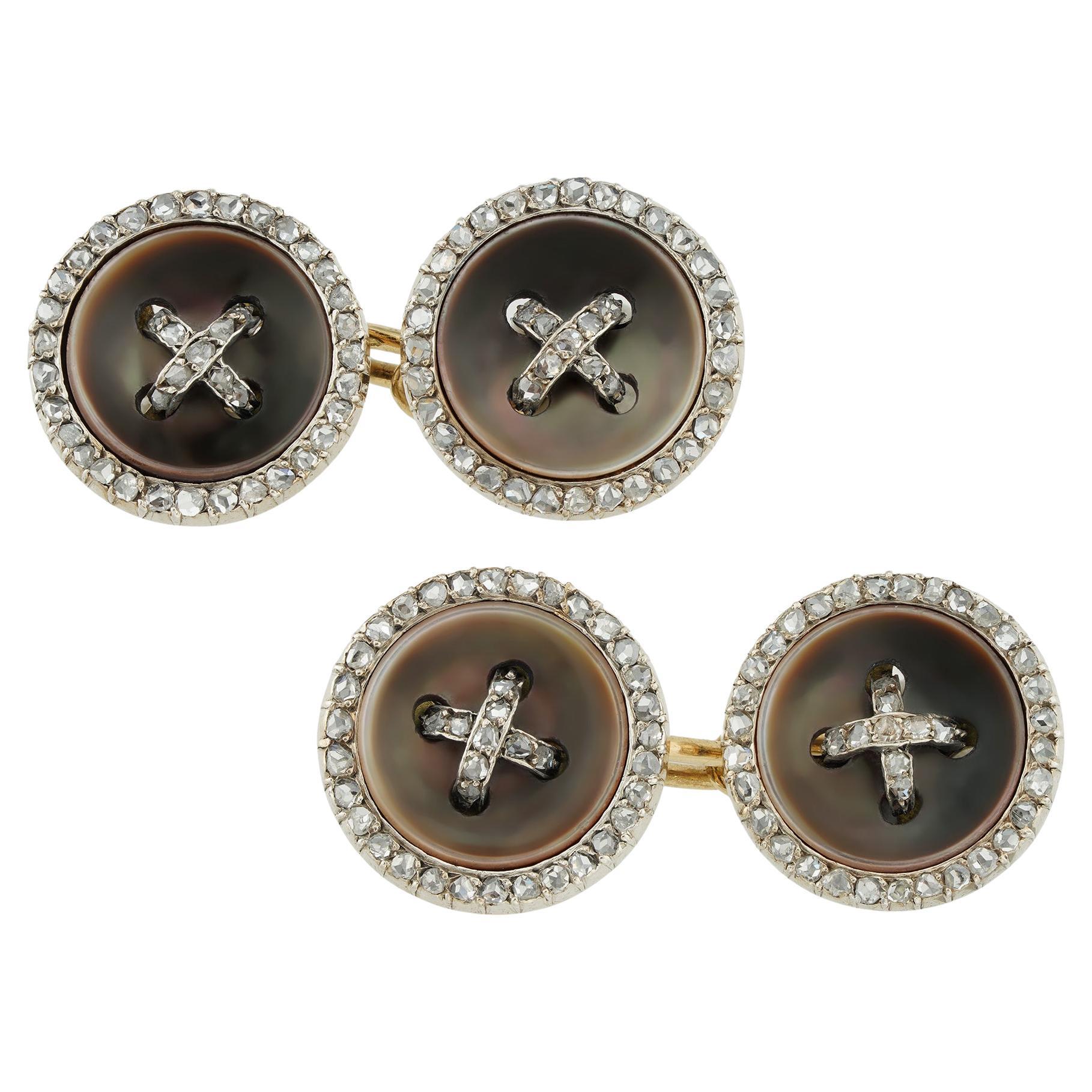A pair of Belle Époque mother of pearl and diamond cufflinks
