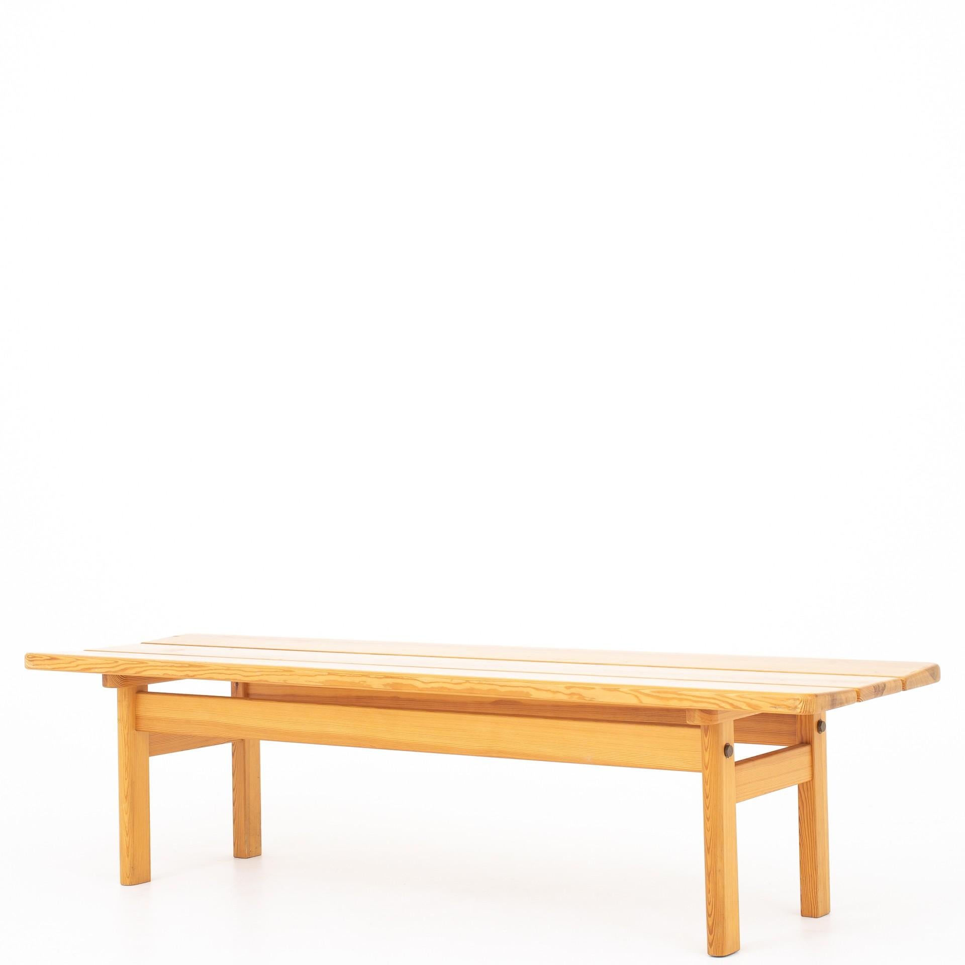 Two benches in solid, lacquered pitch pine. Maker Karl Andersson & Sons.