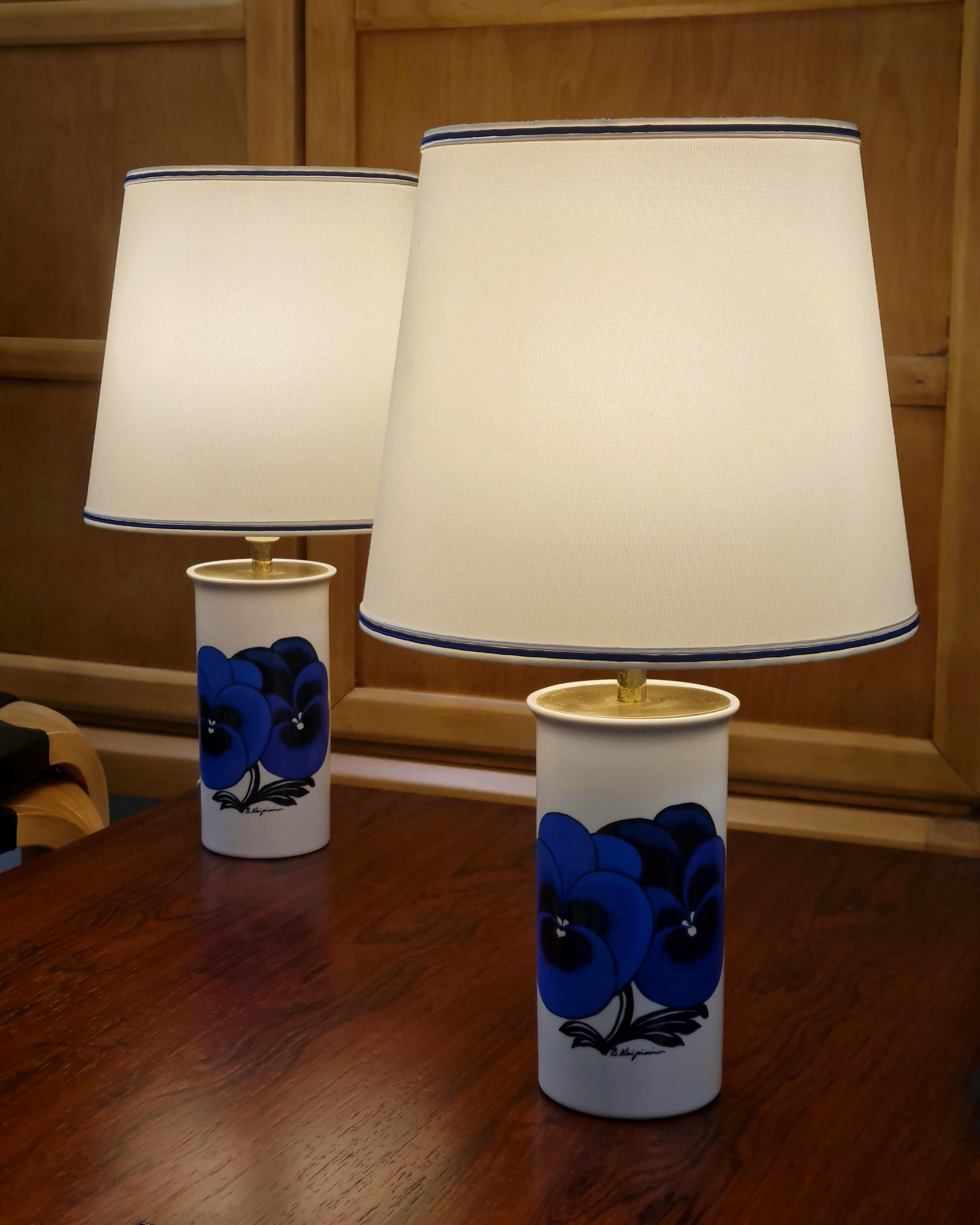 A pair of limited edition table lamps designed by Birger Kaipiainen for the Stockmann 120 year anniversary in 1982. Manufactured by Arabia OY in Finland. A very nice pair in impeccable original condition. Only 150 pieces of these lamps were ever