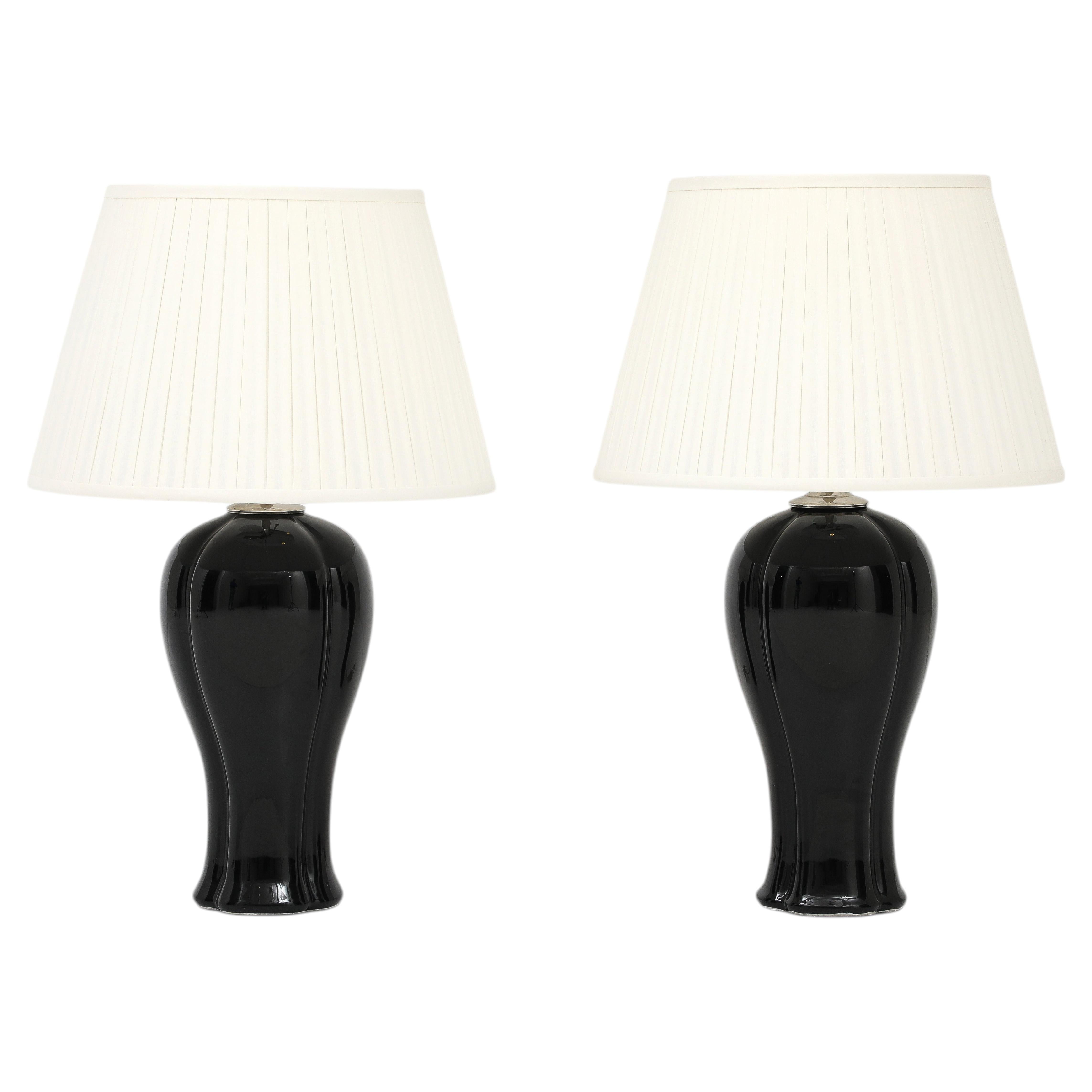 A Pair of Black Ceramic & Nickel Table Lamps