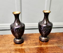 A Pair of Black Cloisonné Baluster Vases on stands