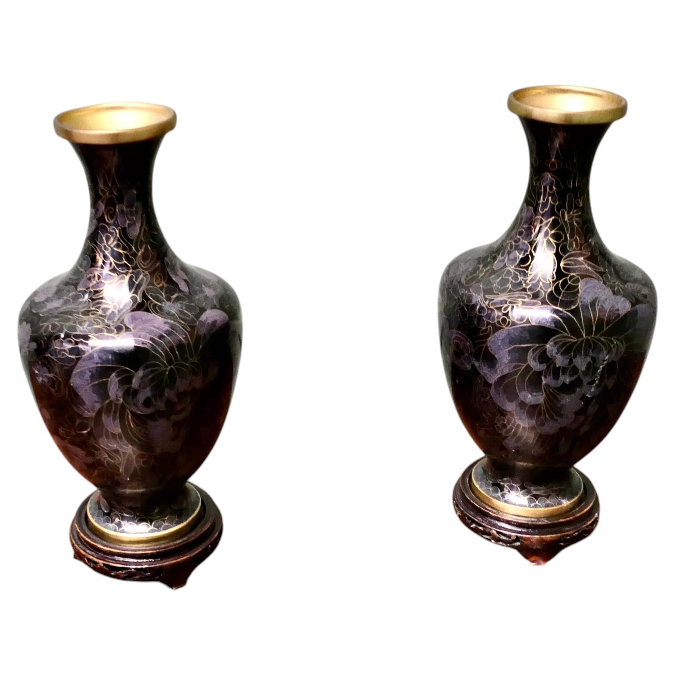 A Pair of Black Cloisonné Baluster Vases on stands