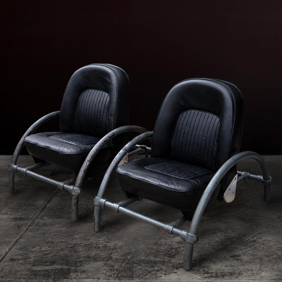 A pair of black leather early production of the iconic Rover chair synonymous as a piece of conceptual art and eighties loft living. The first furniture design conceived by an industrial designer, now highly collectable as a post-modern classic.