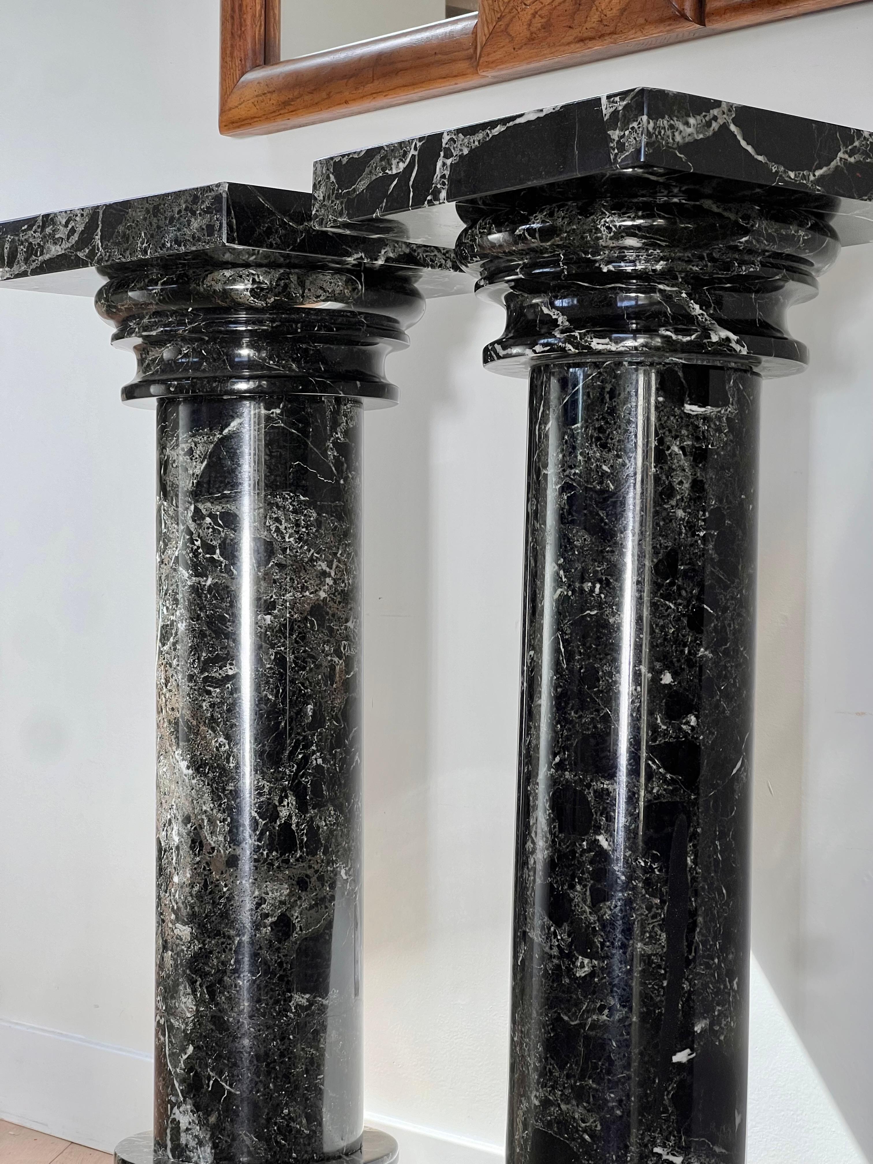 A pair of black marble pedestal columns, late 20th century 3