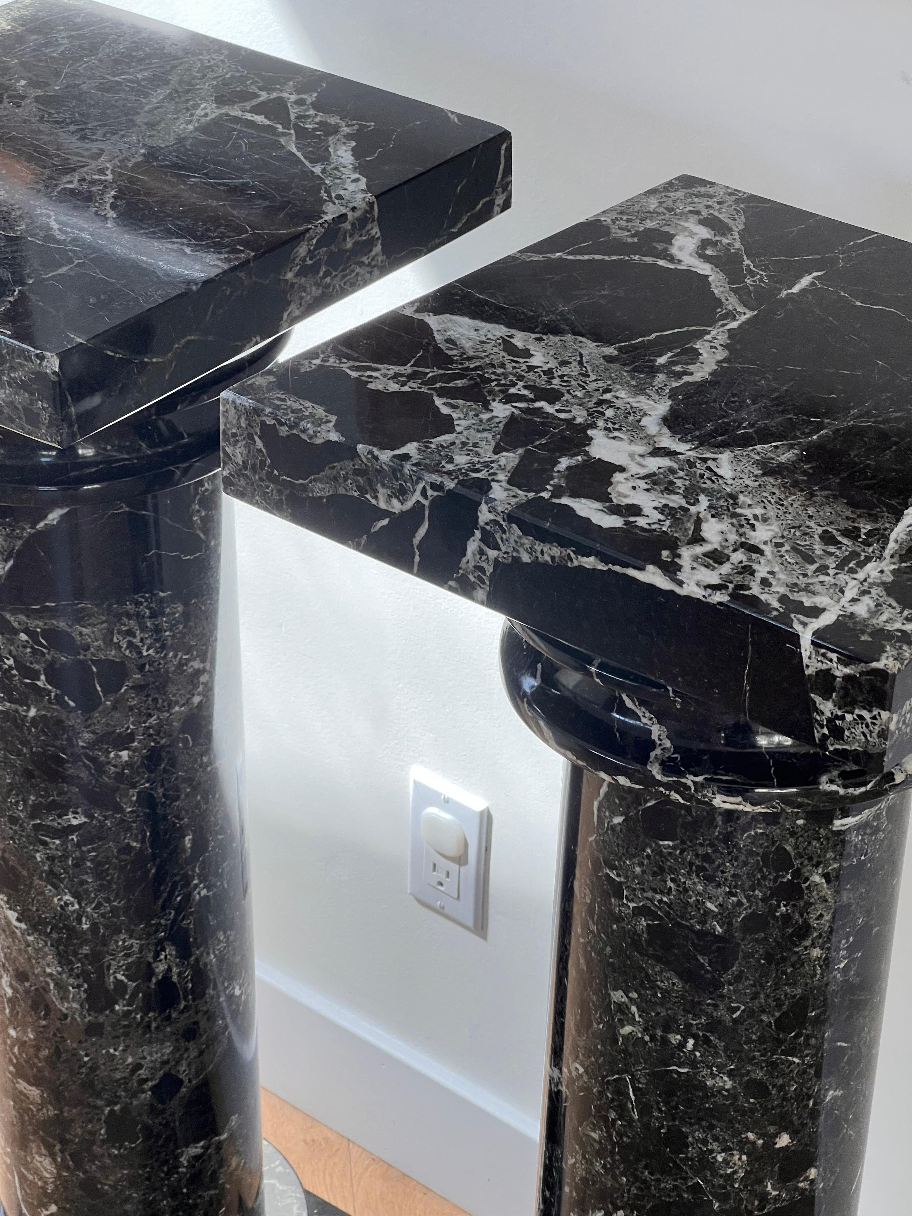 A pair of black marble pedestal columns, late 20th century 6